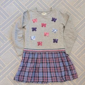 Sweatshirt dress with plaid skirt